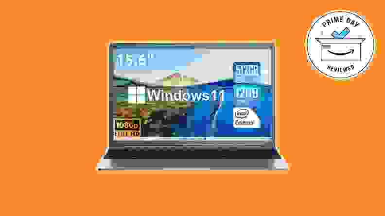 The Sgin 15.6-Inch 512GB Windows 11 Laptop with screen facing forward, against an orange background. A Reviewed approved seal is in the upper right corner.