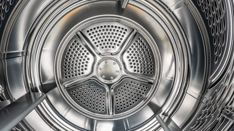 A close-up of the Frigidaire FFRE4120SW dryer's stainless steel drum.