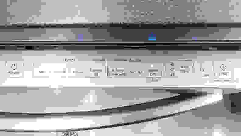 A close-up of the top-mounted control panel on the Samsung DW80R2031US dishwasher.