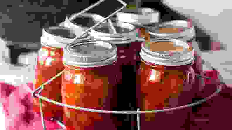 Mason jars in a canning rack
