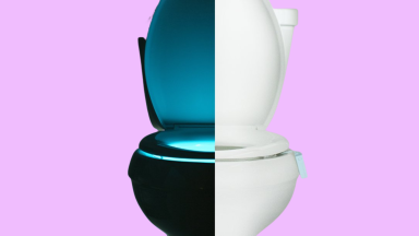 A toilet half during the day and half illuminated at night against a purple background.