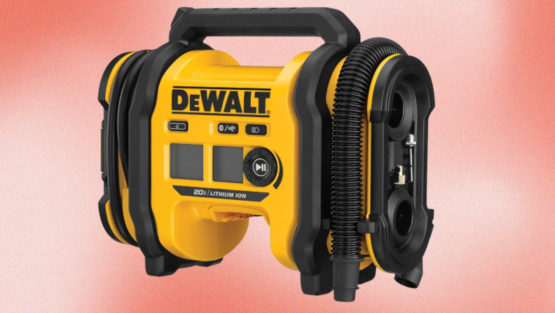 a DeWalt air compressor against a red background