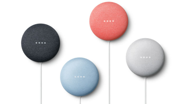 Four colorful Google Nest Minis on a white background