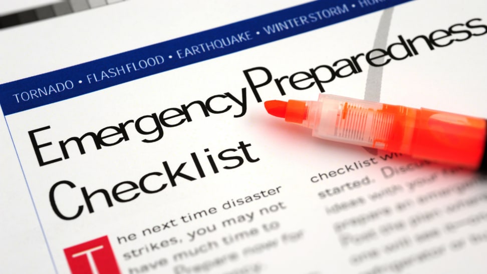 Paper labeled "emergency preparedness checklist" with an orange highlighter on top