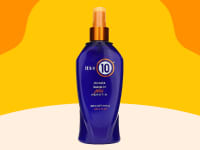 The bottle of It's A 10 Miracle Leave-In Plus Keratin on an orange, yellow, and cream background.
