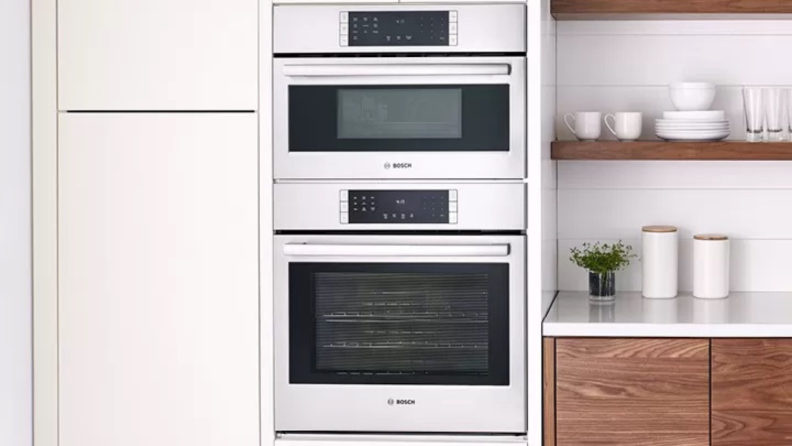 Bosch stacked ovens in modern-style kitchen.