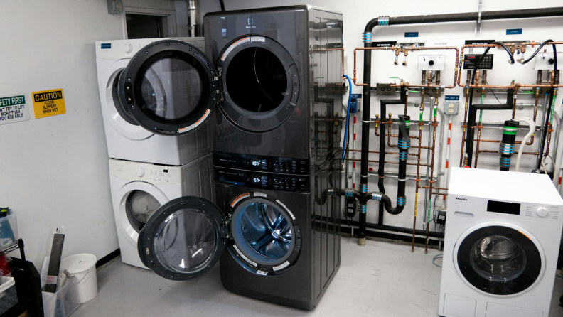 The Electrolux ELTE7600AT washer and dryer tower appears in the Reviewed Lab with its doors open.