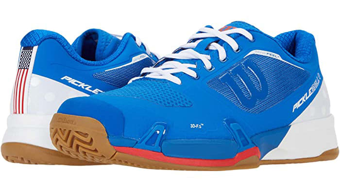 A pair of blue pickleball sneakers on white background