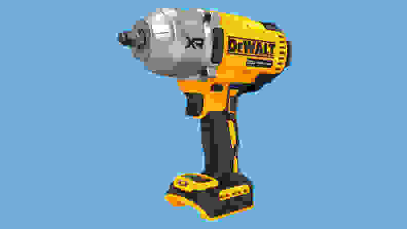 A close-up of the Dewalt DCF900 high-torque impact wrench floating in a blue void.
