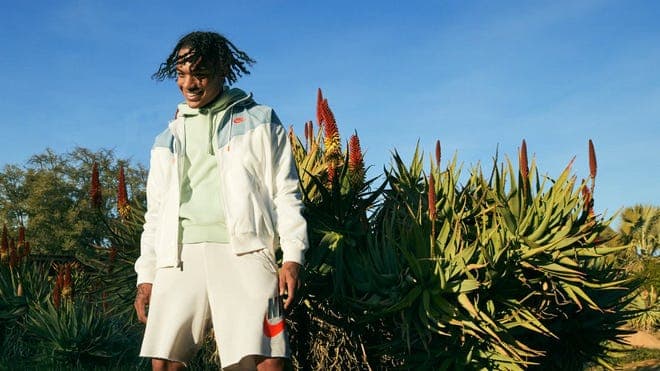 A person wears Nike outside.