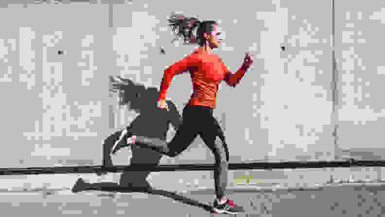woman running on sidewalk