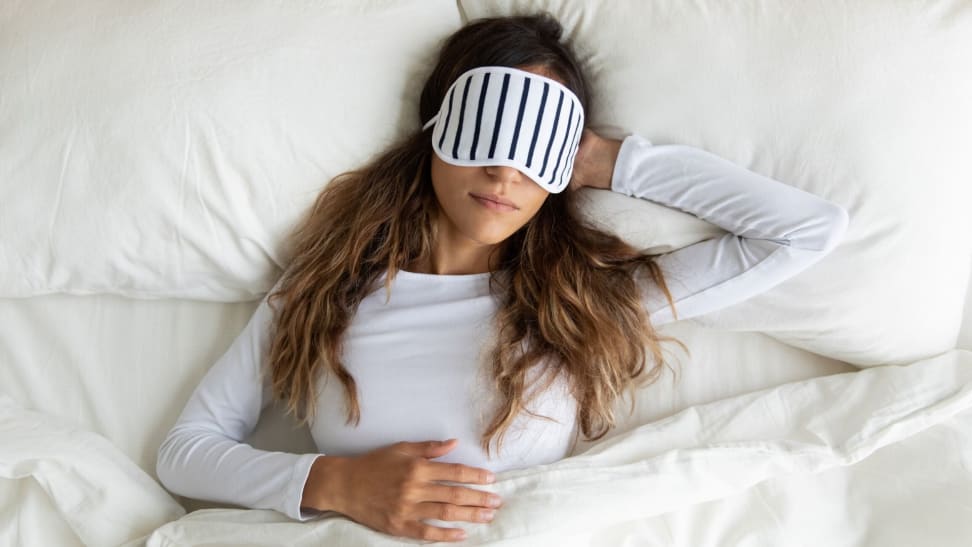 woman sleeps on her back