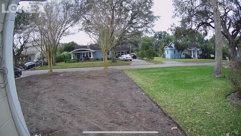 Security camera footage of residential street outside of home.