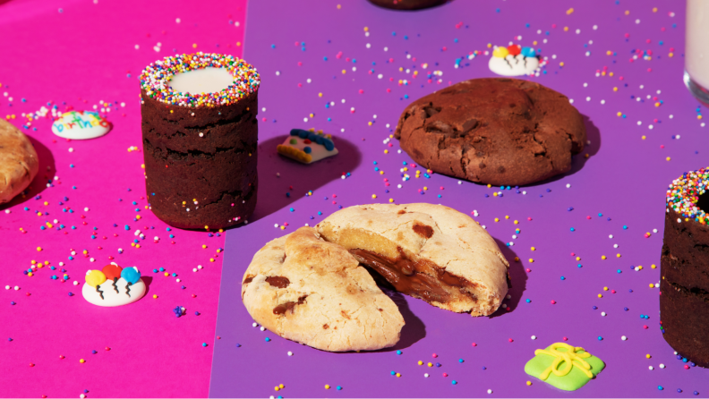 Chocolate cookies and other desserts covered in colored sprinkles.