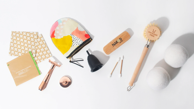 Zipped bags, wooden scrubbers, and laundry balls on a surface.