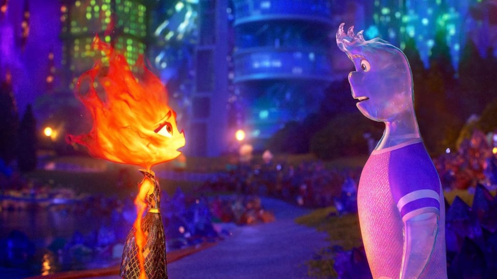 An image of Ember, a fire elemental, standing across from Wade, a water elemental in the movie "Elemental."