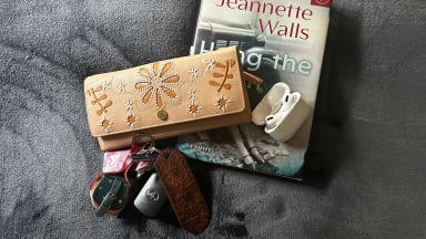 Radley London wallet on a book