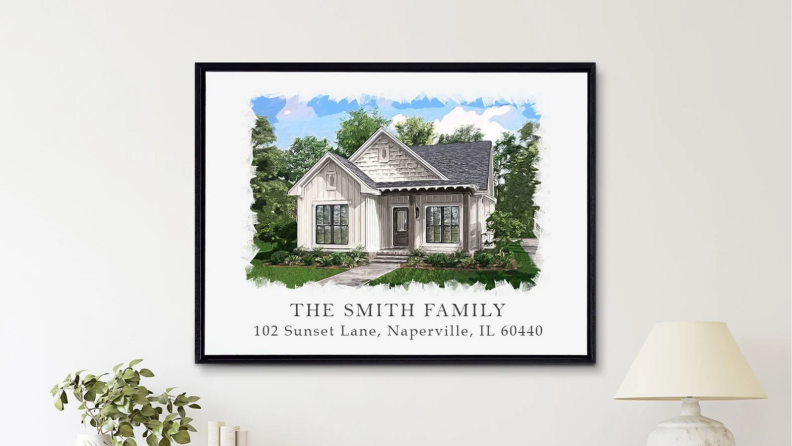 An image of a personalized home painting featuring a house rendered in watercolor style along with the home address and the family name.