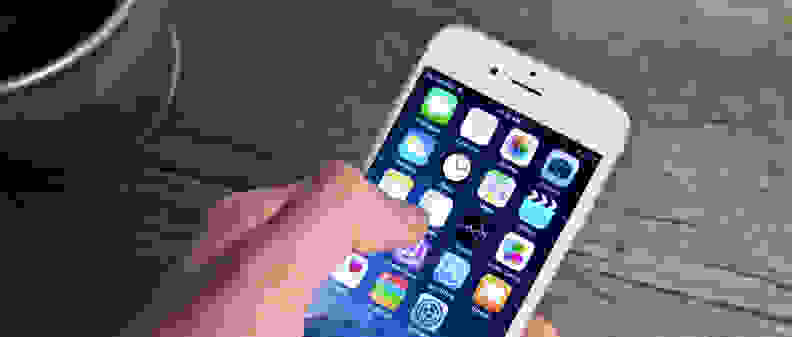 A photograph of the Apple iPhone 6 in use.
