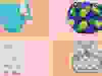 Four swim diapers sit on orange and pink checkered background