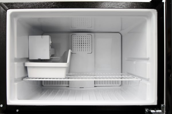 If you want to use the GE GIE16DGHBB's icemaker, you'll have to keep the freezer shelf in its lower slot.