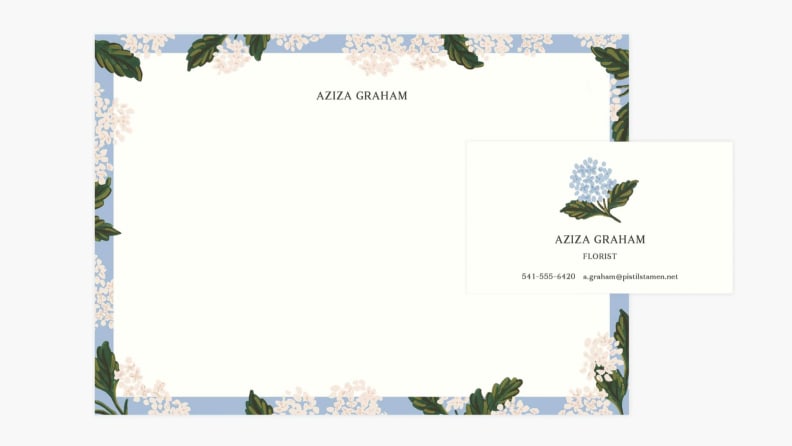 Personalized stationery and business card with floral designs.