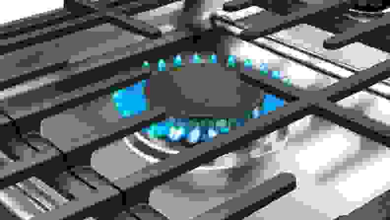 A close-up image of a gas burner with the flame on.