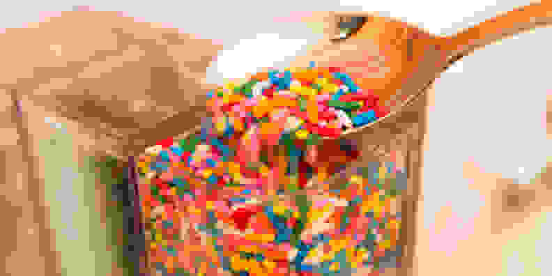 Toppings like these rainbow funfetti sprinkles are best for the front mix-in container, which has the smallest opening.