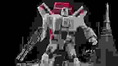 A Transformers action figure on a black background.