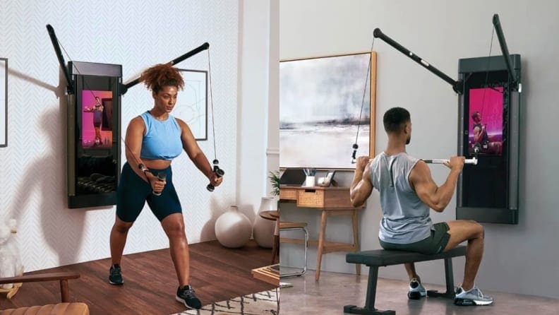Two people work out with a Tonal Smart Home Gym.