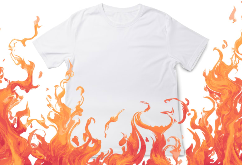 A white t-shirt on a white background has flames leaping over it