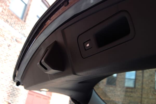 The trunk opens and closes automatically at the touch of a button.