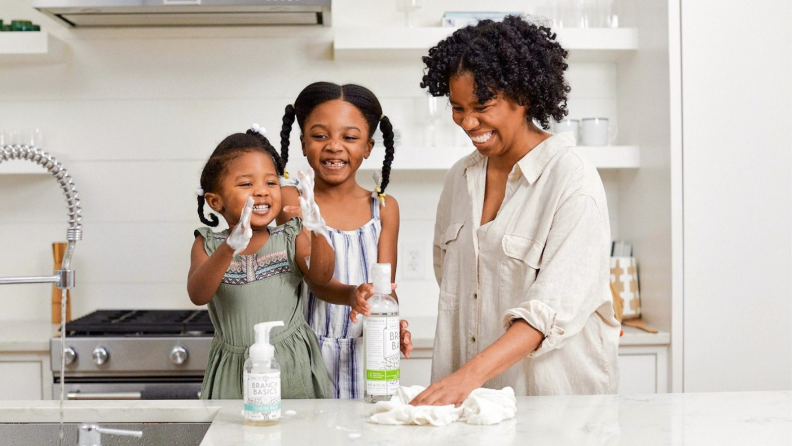 Mom and kids cleaning.