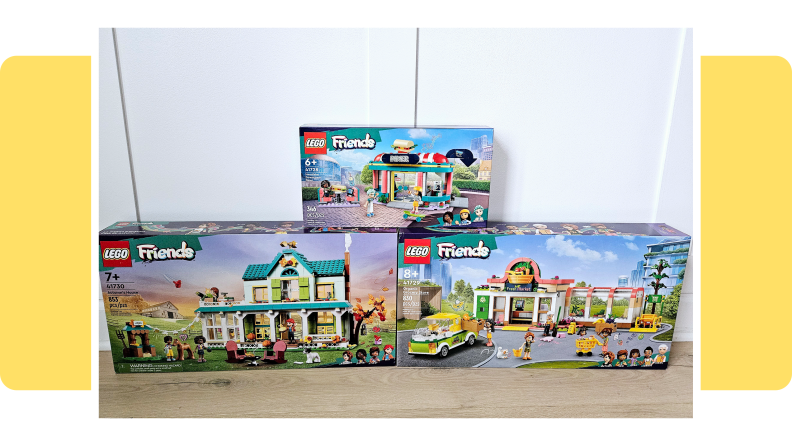 Three different Lego Friends sets featuring, Autumn's House, HeartLake Downtown Diner, and the Organic Grocery Store.