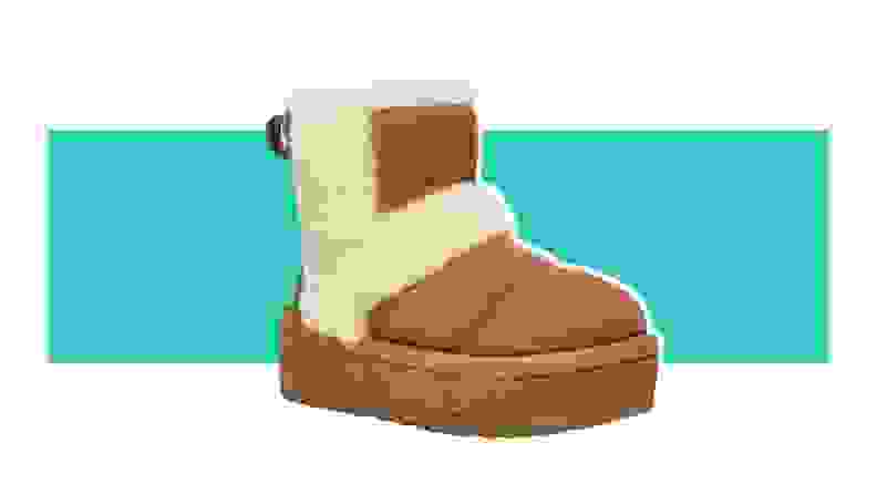 A brown Ugg boot with shearling detailing on the sides.