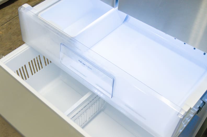 Close-up on the freezer doors, notice the secondary icemaker bin.