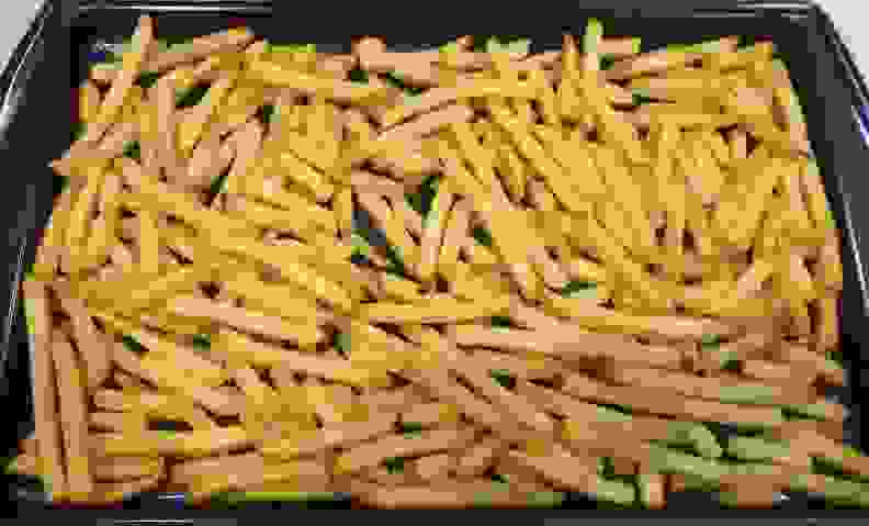 The frozen fries cooked in standard mode did not cook all the way through, and were mushy, somewhat oily, and undercooked.