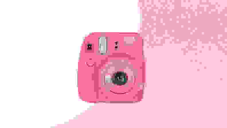 Hot pink Fujifilm instax instant camera