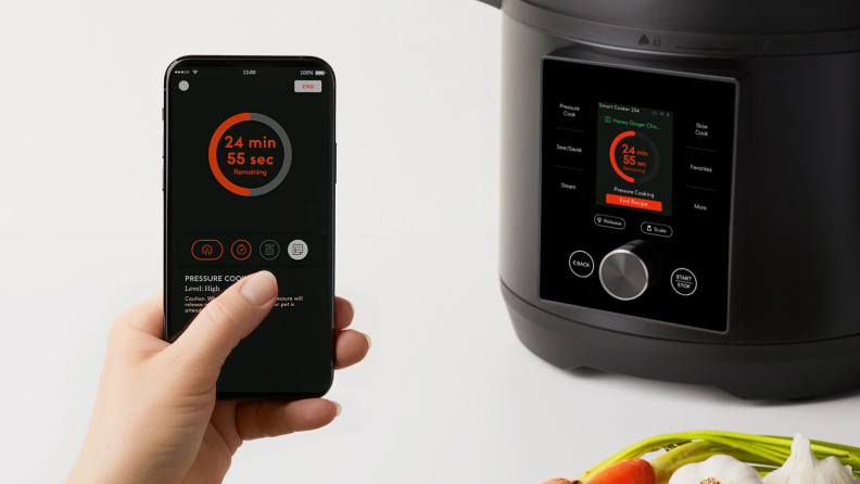 The Chef IQ cooking app has guided cooking tutorials and recipes; the slow cooker display mirrors what's on the app.