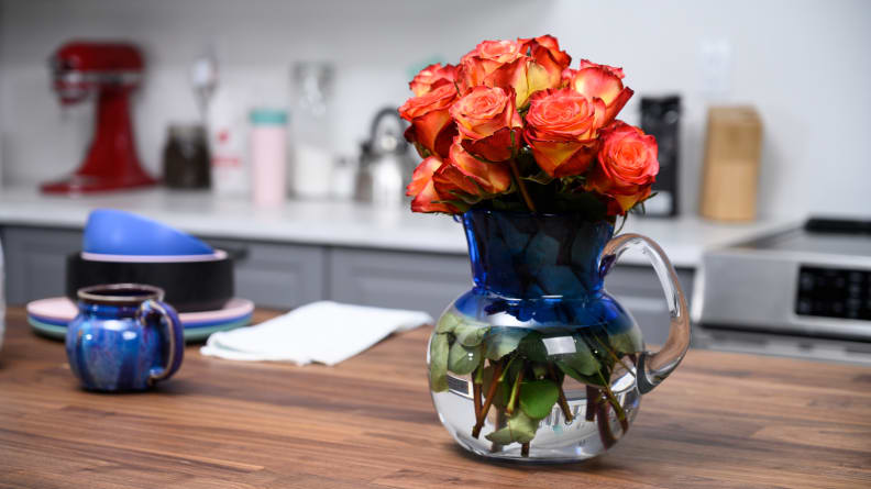 BloomsyBox roses arranged in a vase on a table
