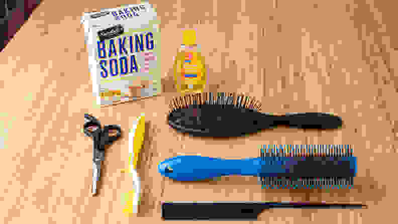 Tools for cleaning a hairbrush