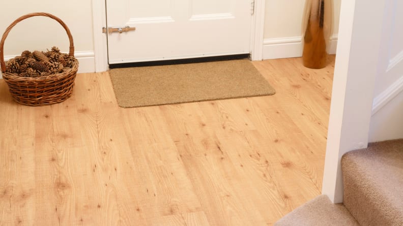 Put a doormat by the door, and remember to use it. Dirt and grit are the enemies of hardwood floors.