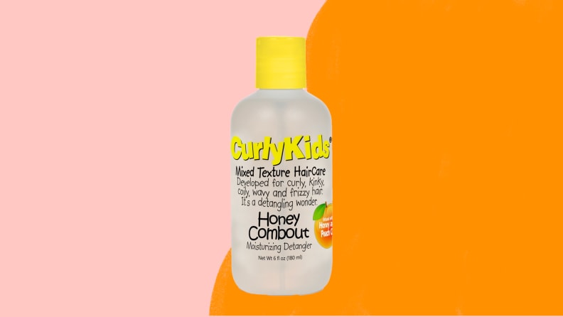 A bottle of CurlyKids shampoo on an orange and pink background.
