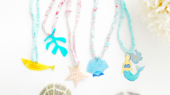 Kids will love crafting their own sea-themed necklaces.