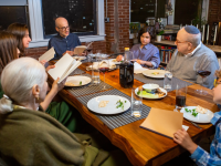 A family celebrates Passover at home.
