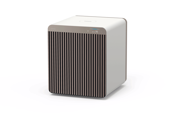 A gif showcasing some of the colors and patterns of the Samsung Cube air purifier. It basically looks like an old, square PC speaker, with a colored plastic grill on its front. That grill is the piece that's customizable.