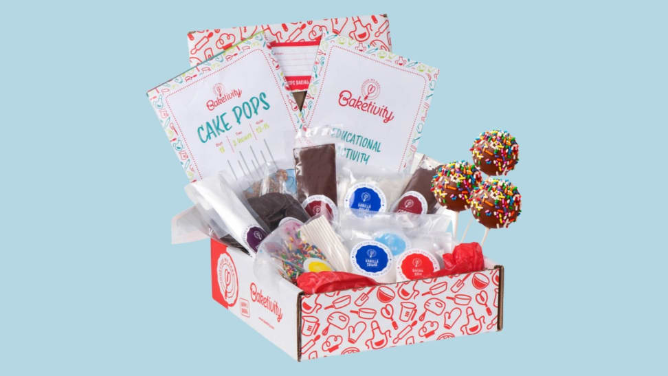An open cake pop kit against a blue background.