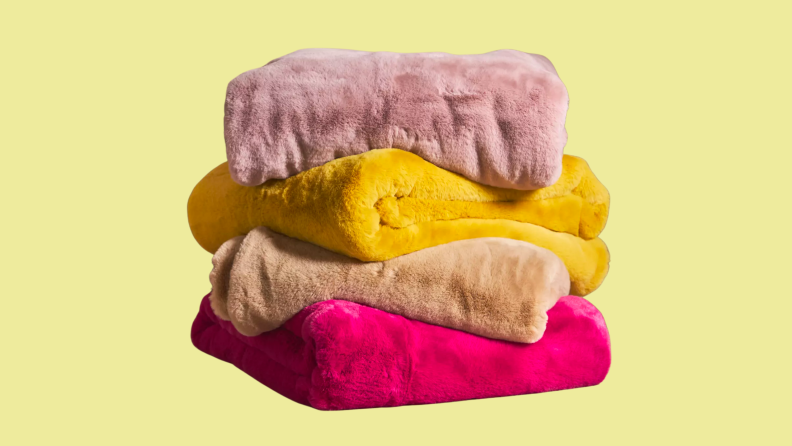 pile of assorted blankets