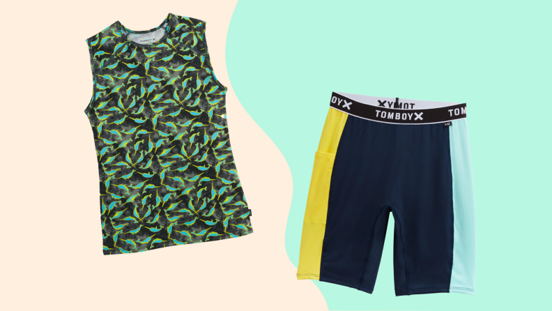 Green and black swim tank and swim shorts.