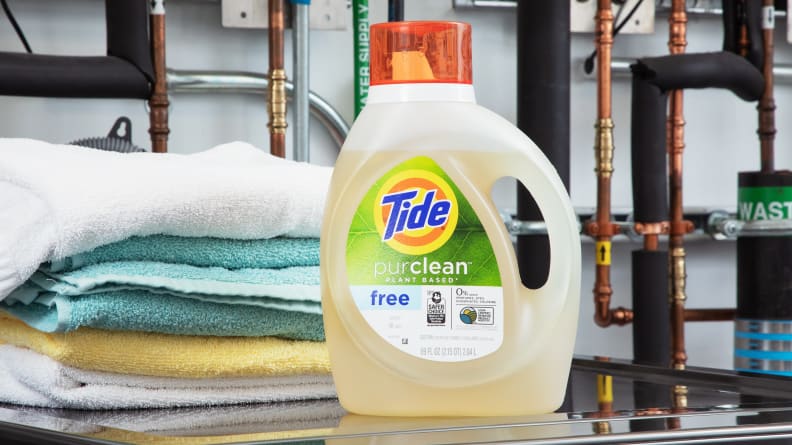 Tide Purclean eco-friendly laundry detergent sitting on top of a washer.